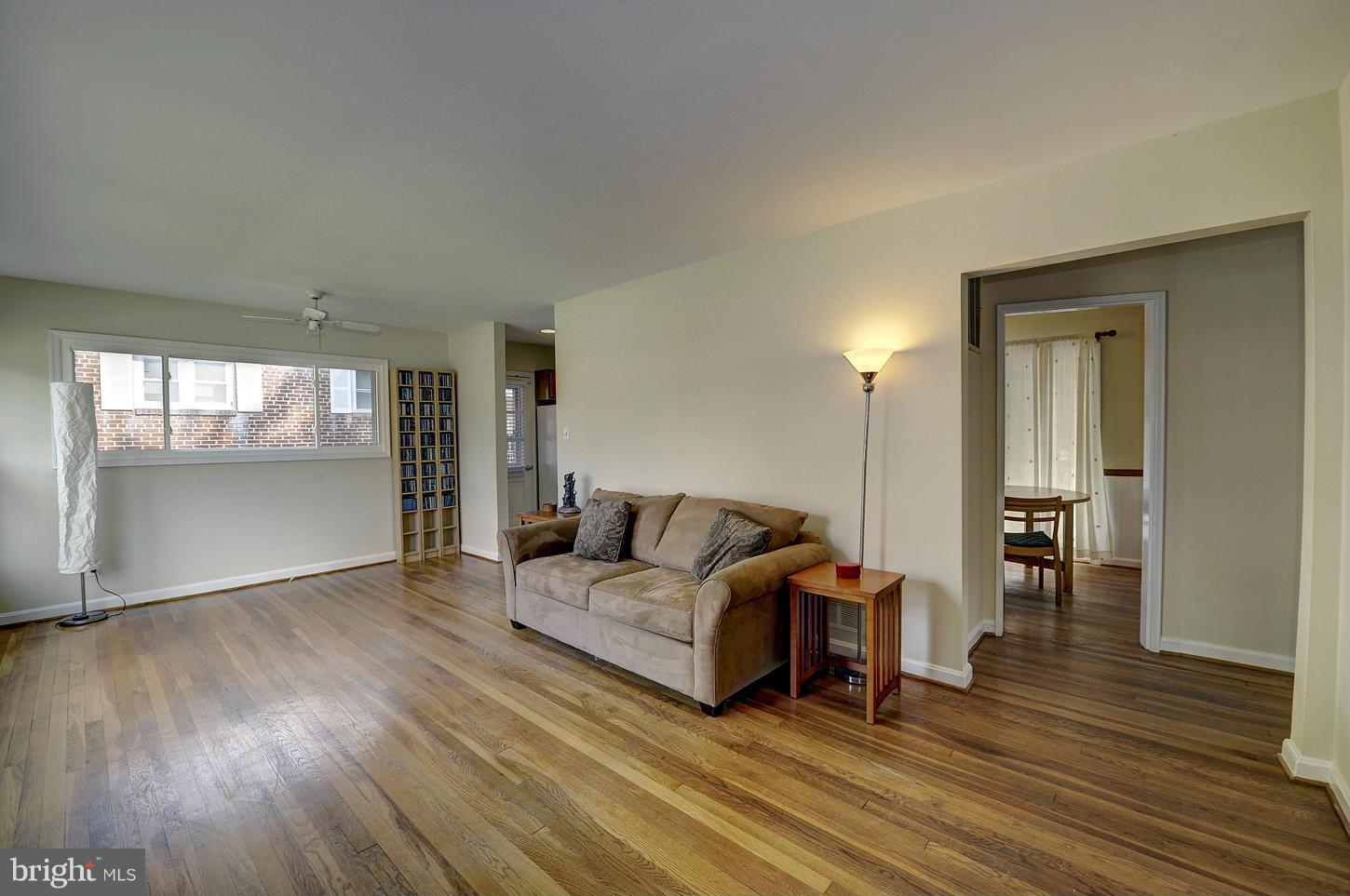 2908 Harris Avenue Silver Spring, MD 20902 - Photo 3 of 30 a living room with furniture and a wooden floor