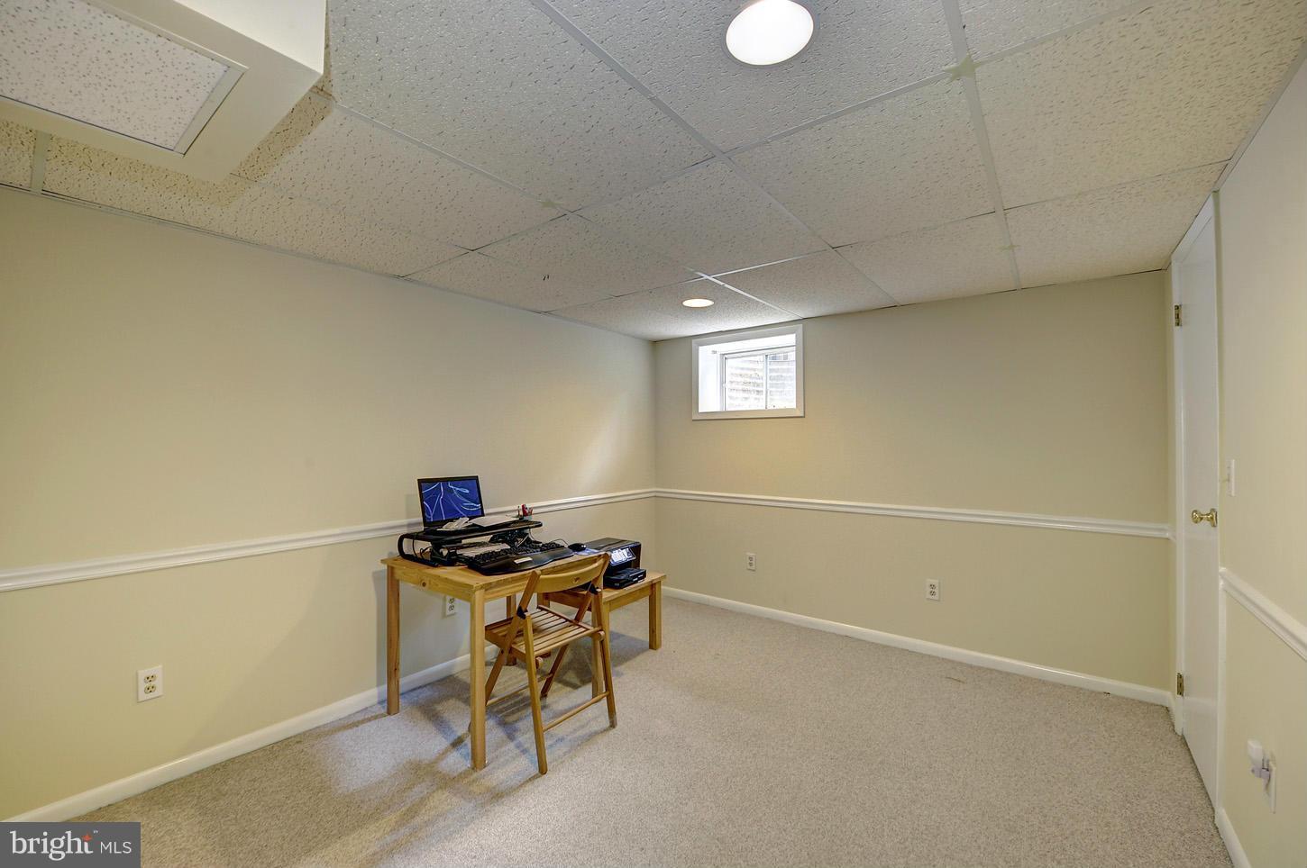 2908 Harris Avenue Silver Spring, MD 20902 - Photo 21 of 30 a view of a workspace with furniture