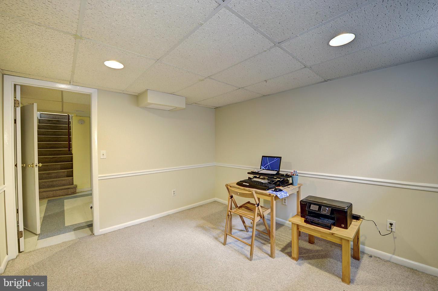 2908 Harris Avenue Silver Spring, MD 20902 - Photo 22 of 30 a room with furniture and white walls