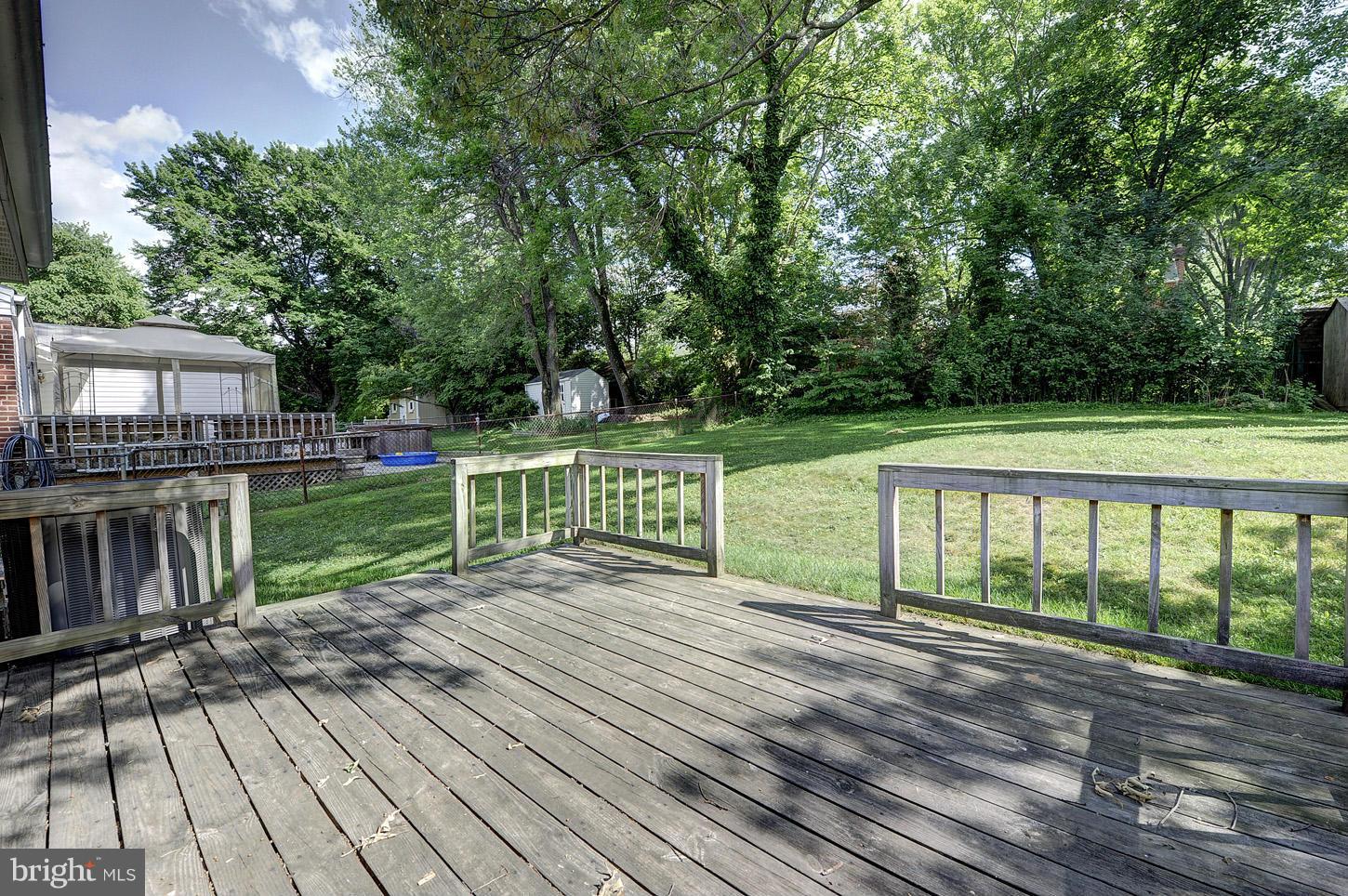 2908 Harris Avenue Silver Spring, MD 20902 - Photo 26 of 30 a view of a deck with wooden floor and fence