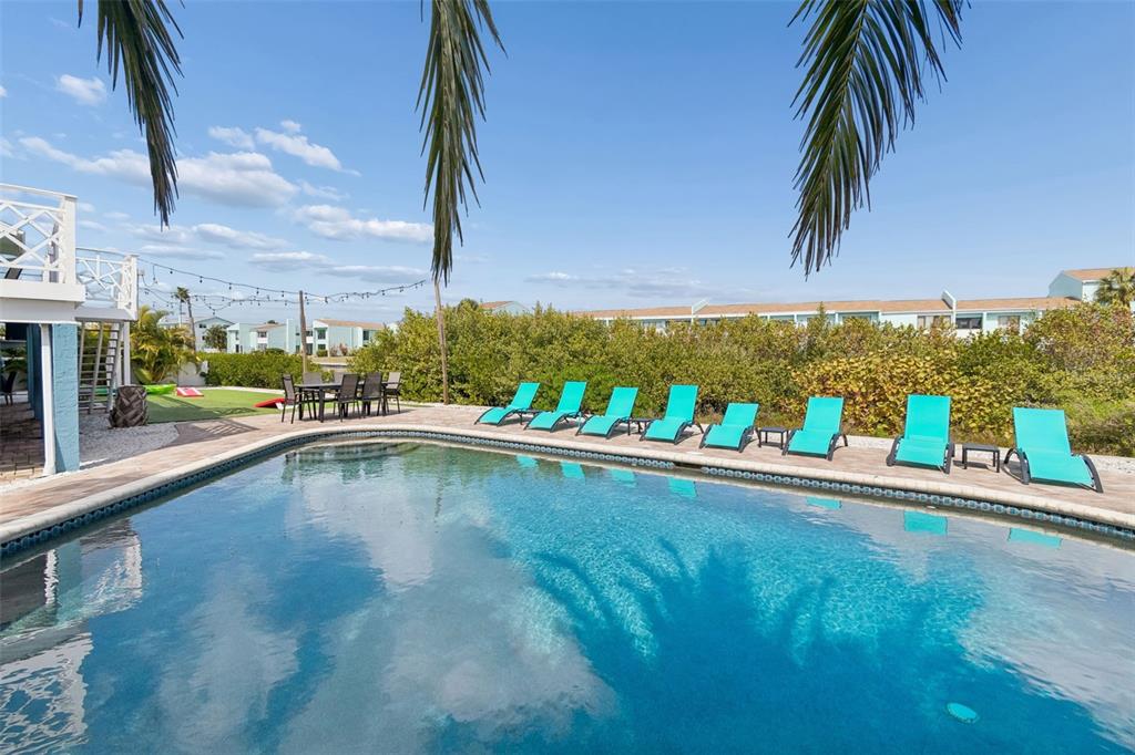330 6th Avenue Indian Rocks Beach, FL 33785 - Photo 39 of 52 a view of a swimming pool with an outdoor seating