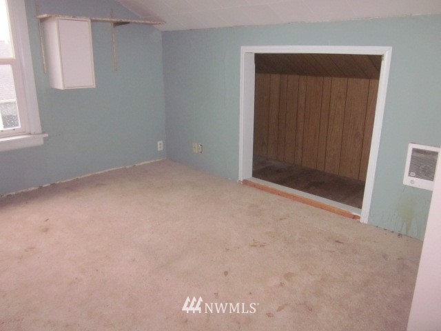 378 Boistfort Road Curtis, WA 98538 - Photo 14 of 18 an empty room with windows