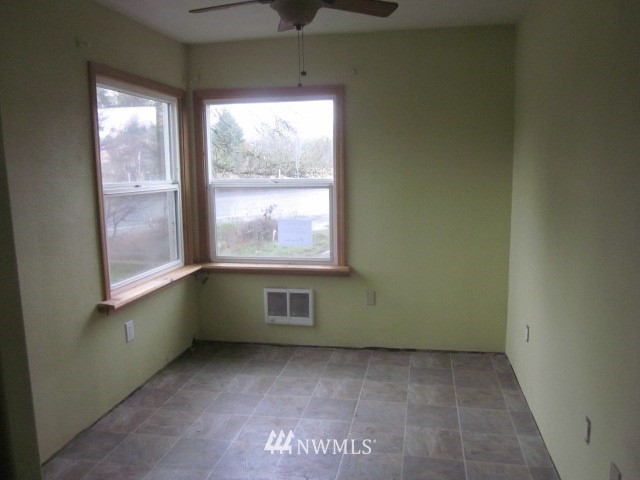 378 Boistfort Road Curtis, WA 98538 - Photo 6 of 18 an empty room with a window