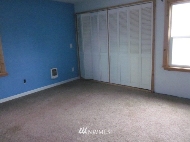378 Boistfort Road Curtis, WA 98538 - Photo 8 of 18 a view of an empty room with a window