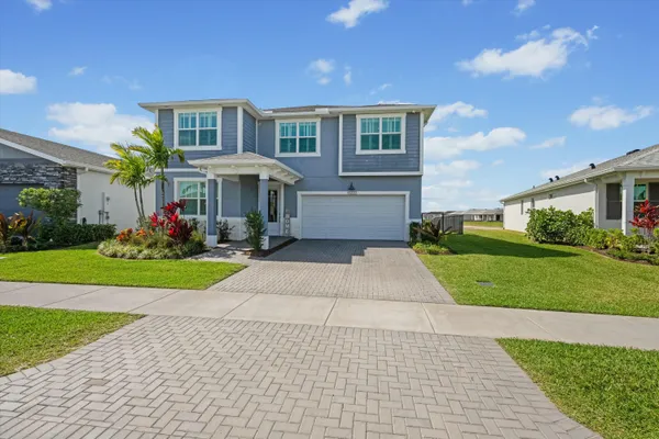a front view of house with yard