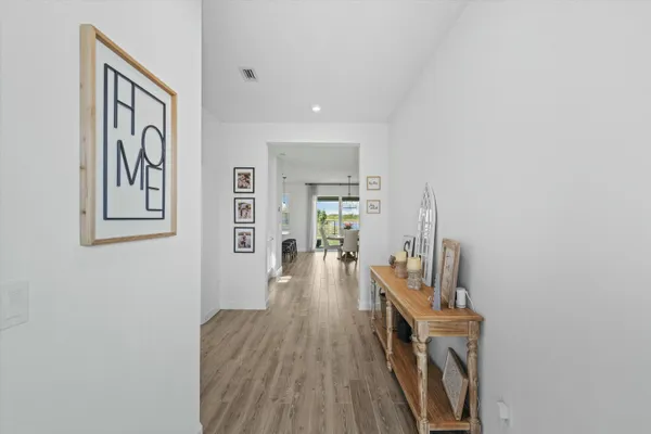 a view of a living room and dining room