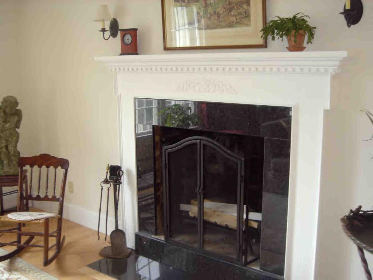 56 Interlaken Road Stockbridge, MA 01262 - Photo 8 of 8 a close view of a livingroom with furniture and a fireplace