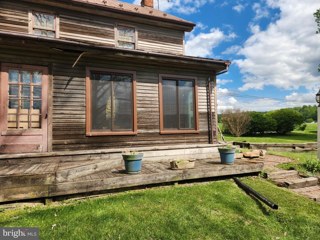 736 Strasburg Road Paradise, PA 17562 - Photo 24 of 87 a backyard of a house with outdoor seating