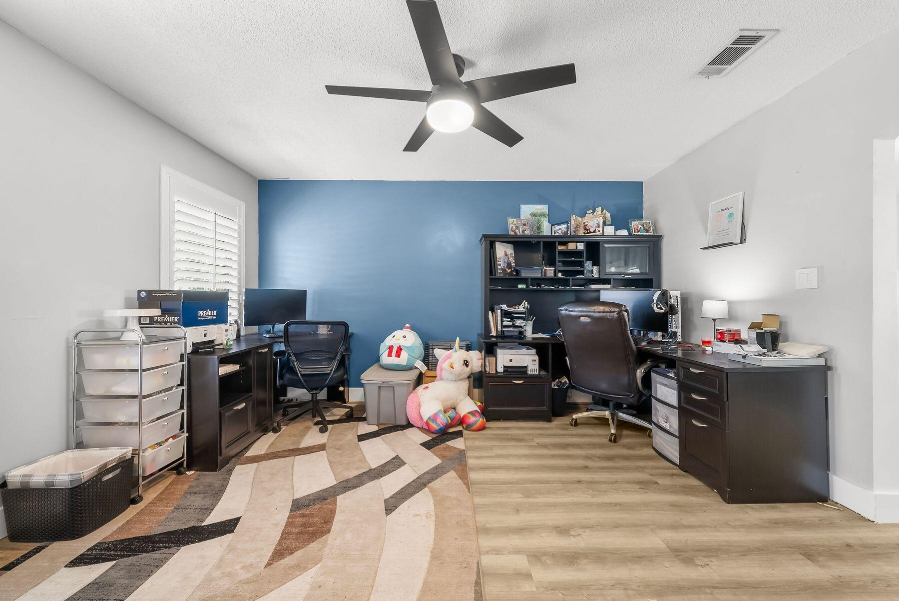 1218 Tuscany Road Panama City, FL 32405 - Photo 12 of 34 a room with storage and utility room