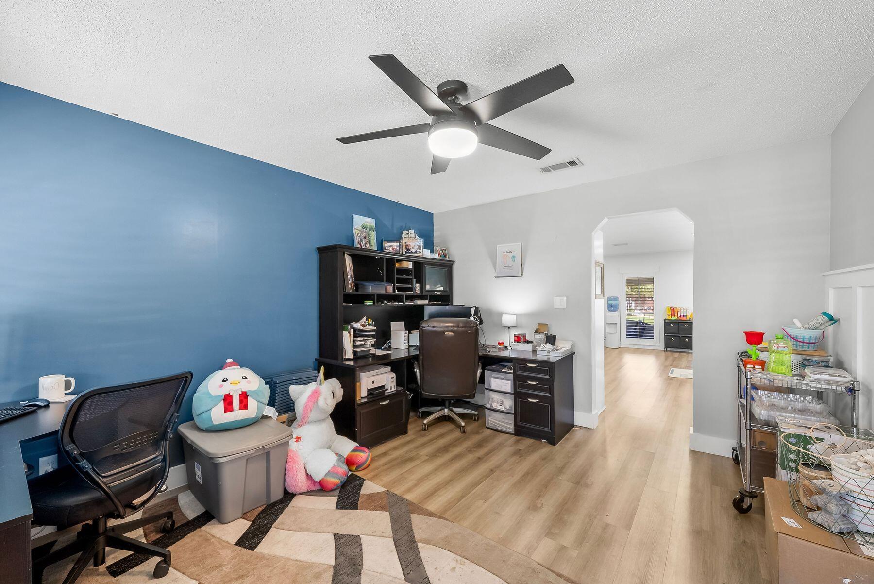 1218 Tuscany Road Panama City, FL 32405 - Photo 13 of 34 a view of a workspace with furniture