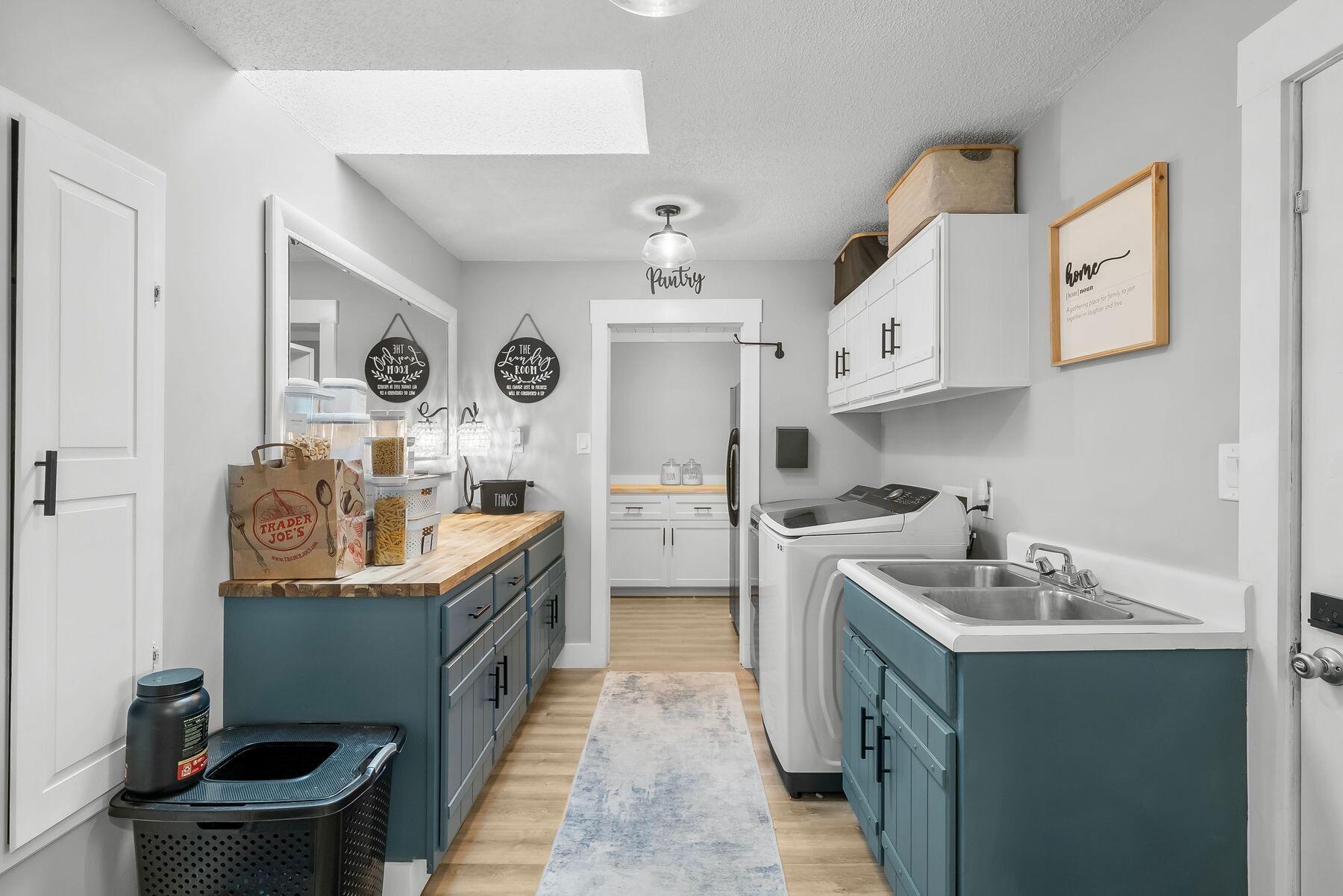 1218 Tuscany Road Panama City, FL 32405 - Photo 15 of 34 a kitchen with a sink stove and refrigerator