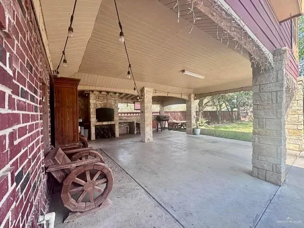 a view of a livingroom with furniture and a fireplace