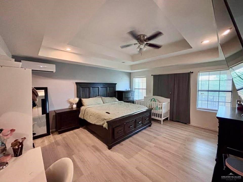 3113 Pradera Street Mission, TX 78574 - Photo 7 of 20 a spacious bedroom with a bed and window