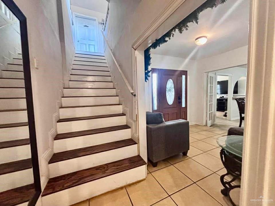 3113 Pradera Street Mission, TX 78574 - Photo 9 of 20 a view of a livingroom with furniture and staircase