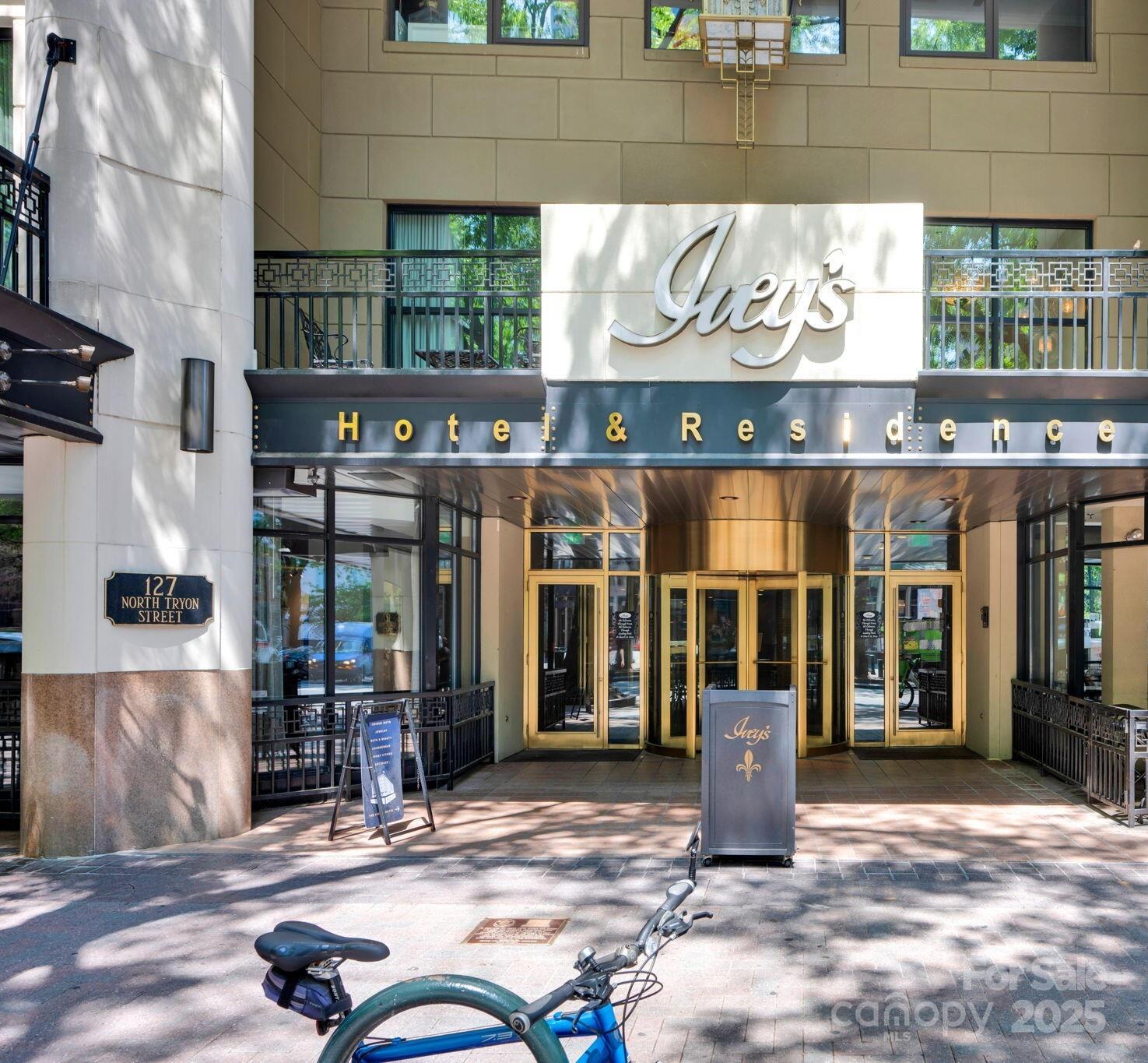 127 North Tryon Street, Unit 404 Charlotte, NC 28202 - Photo 1 of 22 a view of a building with a outdoor space