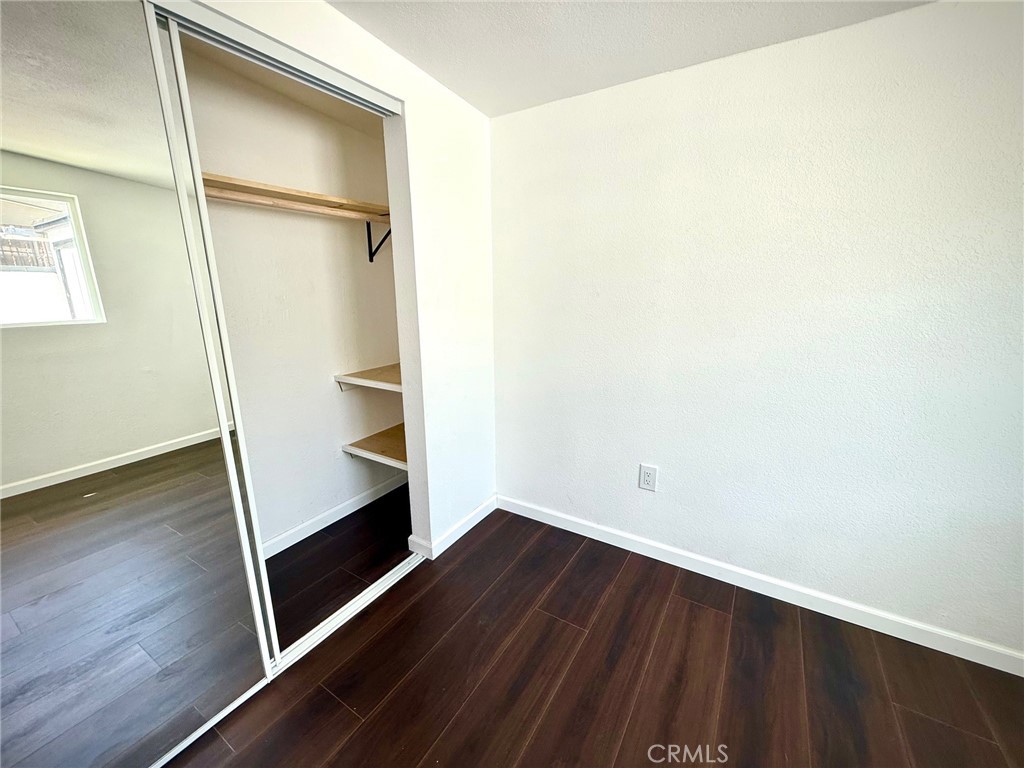 8231 Comolette Street Downey, CA 90242 - Photo 8 of 25 wooden floor in an empty room