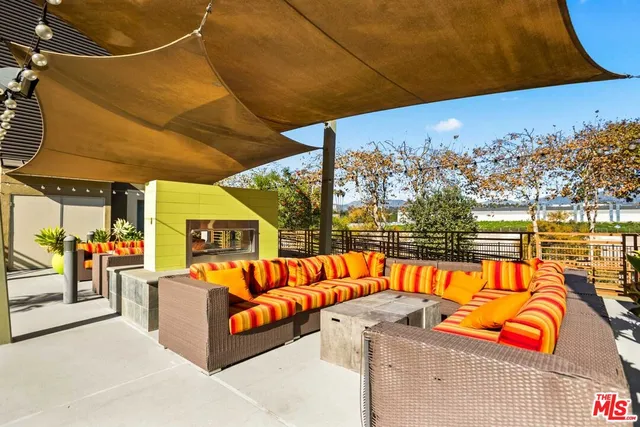 a view of a chairs and tables in the patio