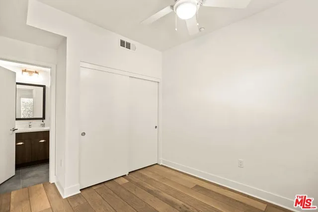 an empty room with a bathroom