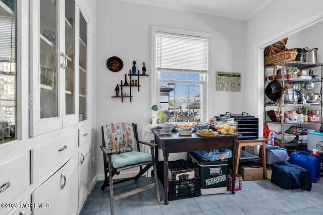 a view of a workspace with furniture and toys