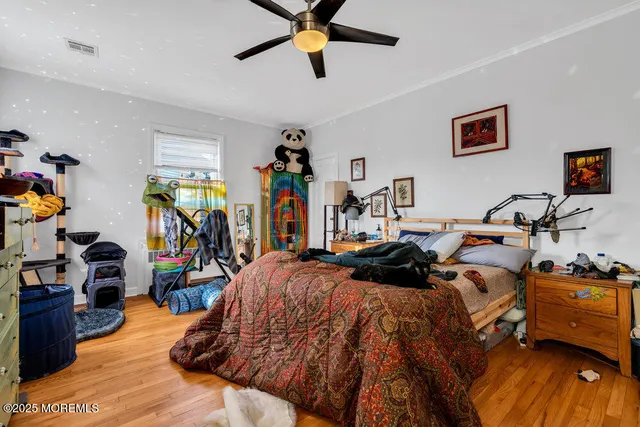 a bed room with a bed and a view of bedroom