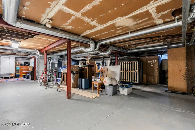 a view of parking garage with cars