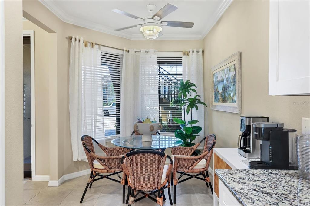 13703 Messina Loop, Unit 102 Bradenton, FL 34211 - Photo 18 of 74 a dining room with furniture and window