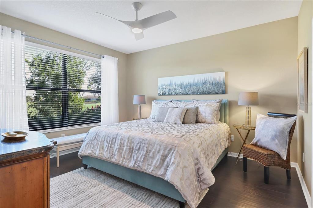 13703 Messina Loop, Unit 102 Bradenton, FL 34211 - Photo 23 of 74 a bedroom with a bed and a window