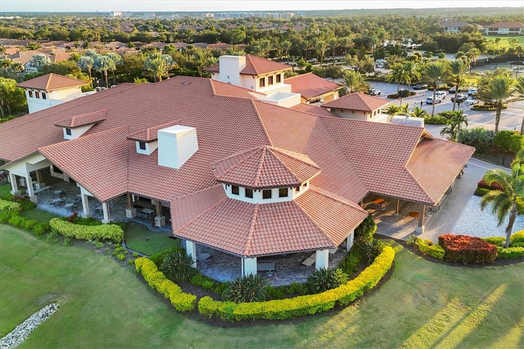 13703 Messina Loop, Unit 102 Bradenton, FL 34211 - Photo 51 of 74 an aerial view of a house with a swimming pool yard and large tree