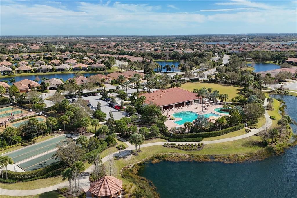13703 Messina Loop, Unit 102 Bradenton, FL 34211 - Photo 74 of 74 an aerial view of residential houses with outdoor space