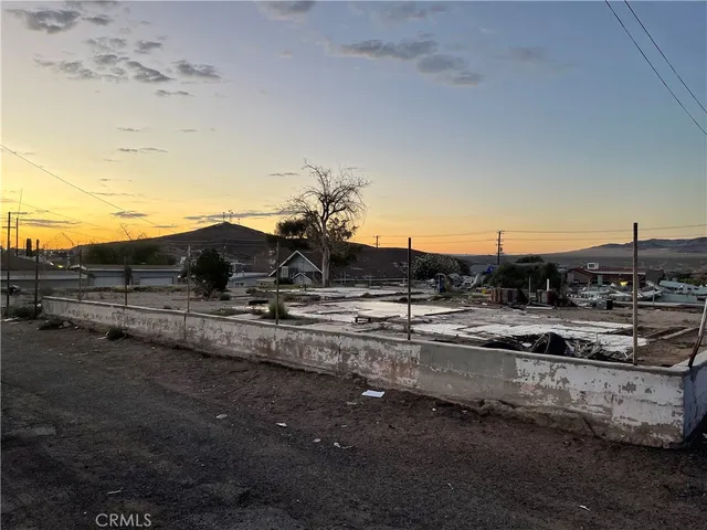 a view of a road with an ocean view