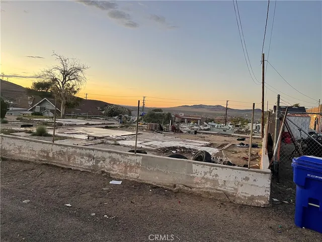 a view of a house with a mountain