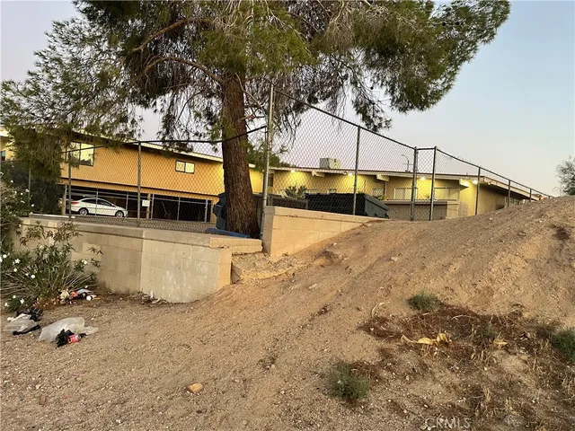 a view of car parked on road with city view