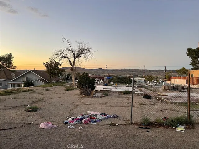 a view of a backyard of a house