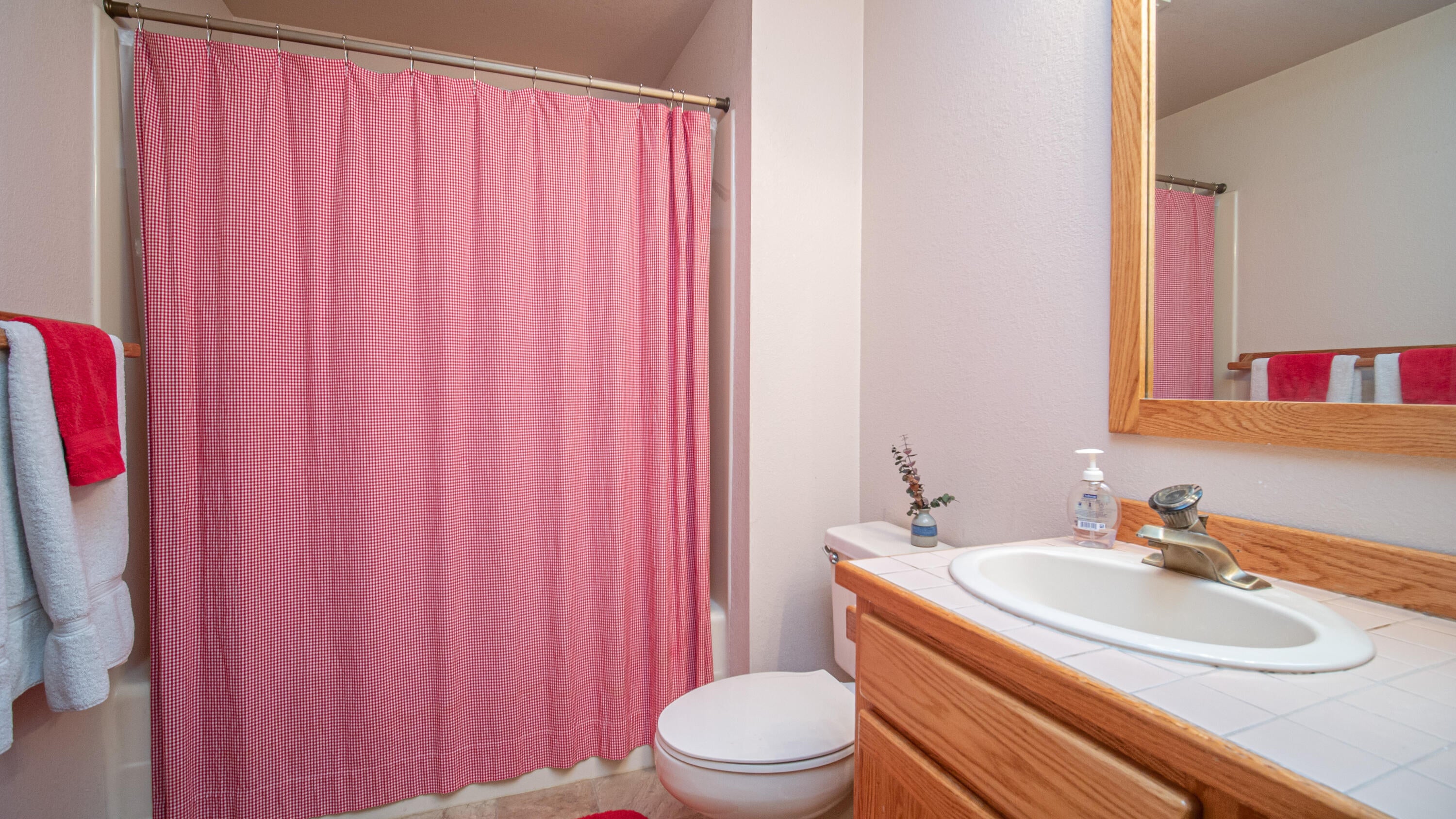 17932 Rhododendron Lane Sunriver, OR 97707 - Photo 23 of 32 The downstairs bath is clean and simple.