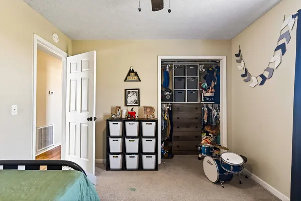 a room with toys and white walls