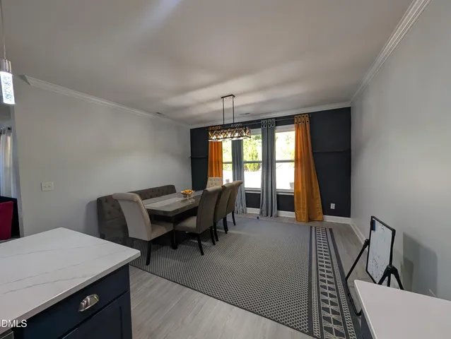 a workspace with furniture and window