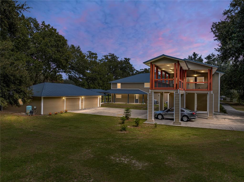 4850 Old Berkley Road Auburndale, FL 33823 - Photo 1 of 1 a front view of a house with a yard