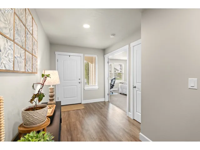 a very nice looking room with wooden floor