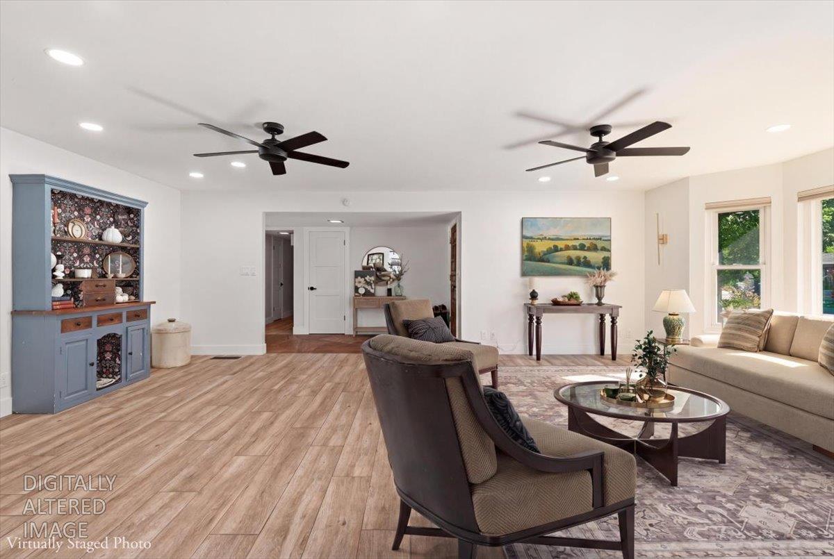4849 Alexon Way Carmichael, CA 95608 - Photo 6 of 50 a living room with furniture a flat screen tv and a table