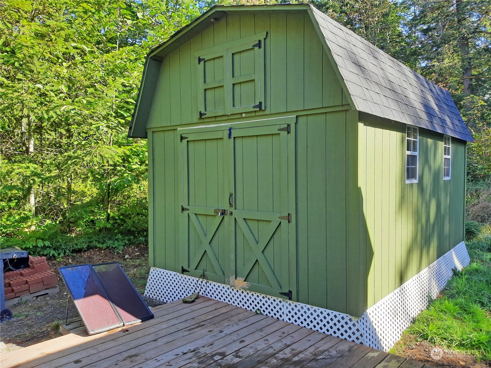 0 Lakenes Road Quilcene, WA 98376 - Photo 14 of 25 a backyard of a house with seating space