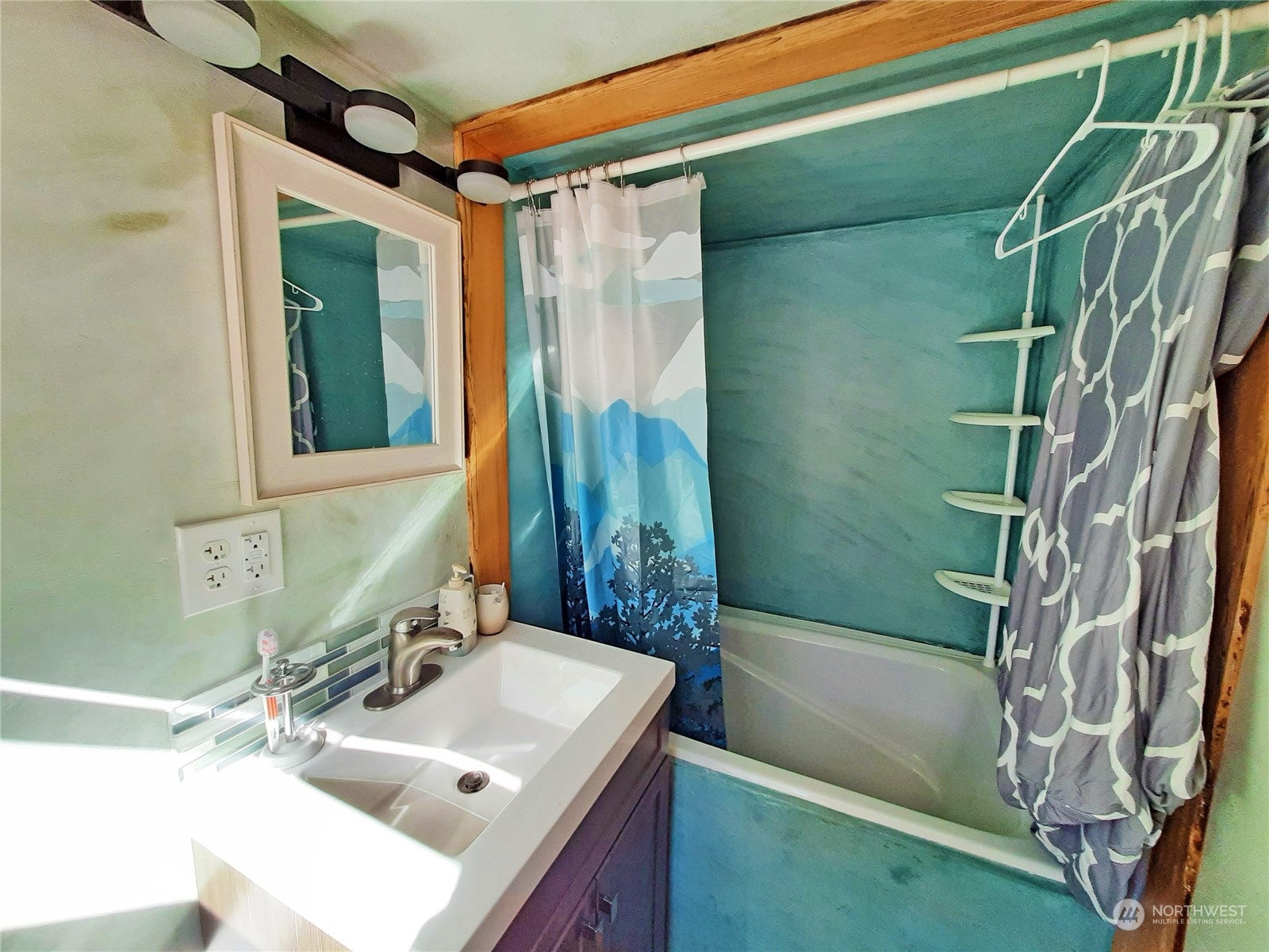 0 Lakenes Road Quilcene, WA 98376 - Photo 4 of 25 a bathroom with a sink and a mirror