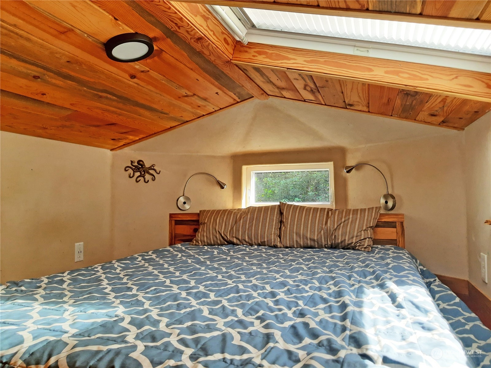 0 Lakenes Road Quilcene, WA 98376 - Photo 5 of 25 a bedroom with a bed and a window