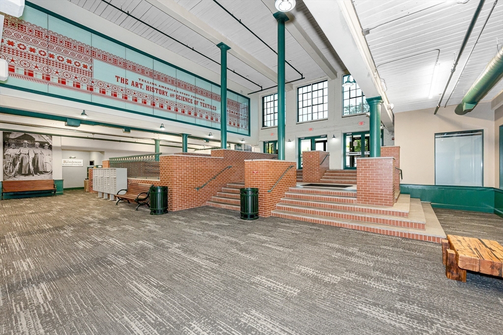 491 Dutton Street, Unit 320 Lowell, MA 01854 - Photo 27 of 31 a view of a building with stairs