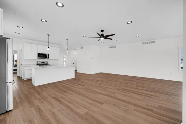 a view of small space with wooden floor