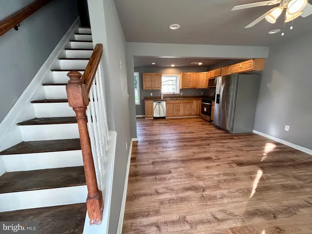 wooden floor with an entryway