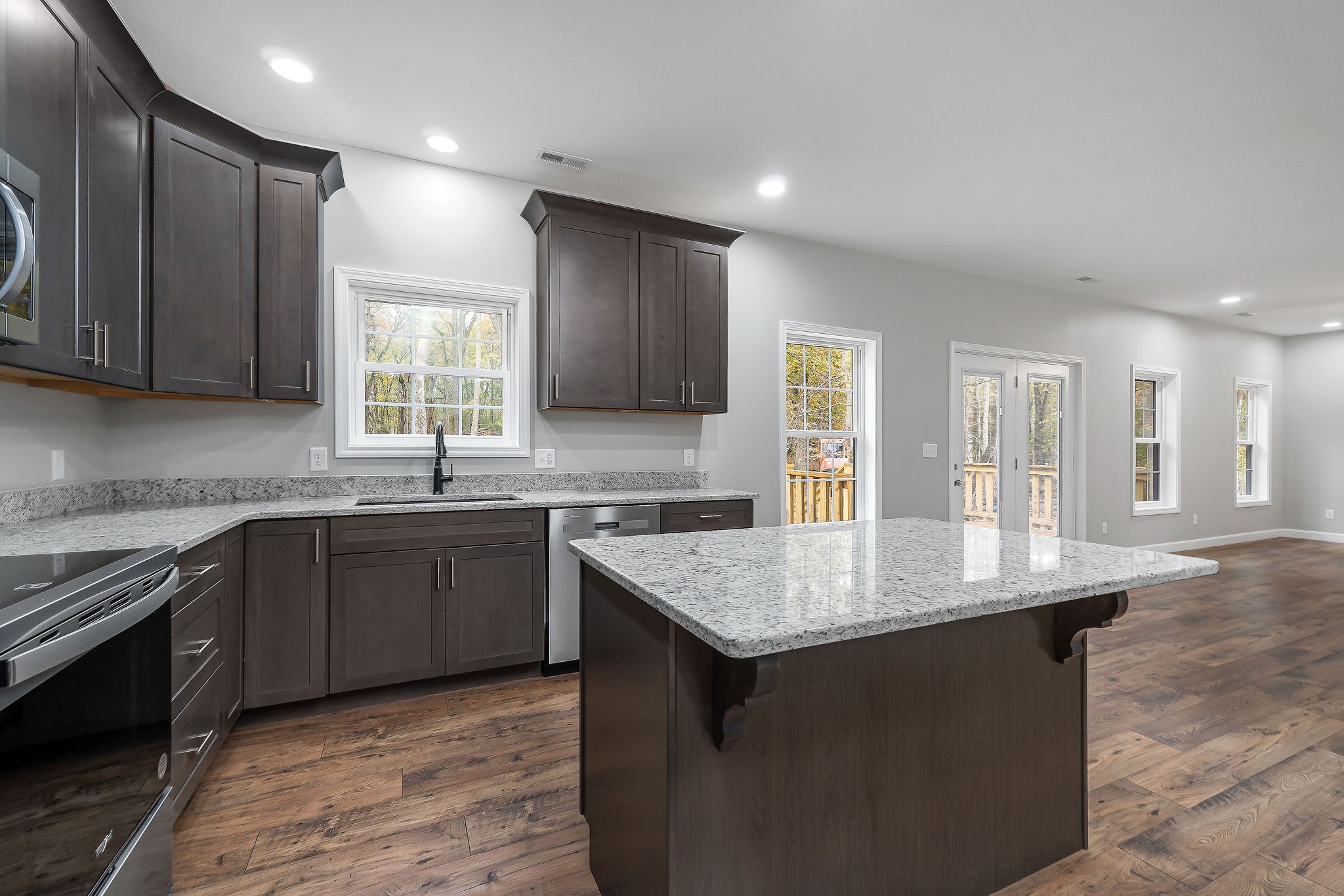 179 Park Road Rickman, TN 38580 - Photo 13 of 29 a kitchen with granite countertop a sink counter top space and cabinets