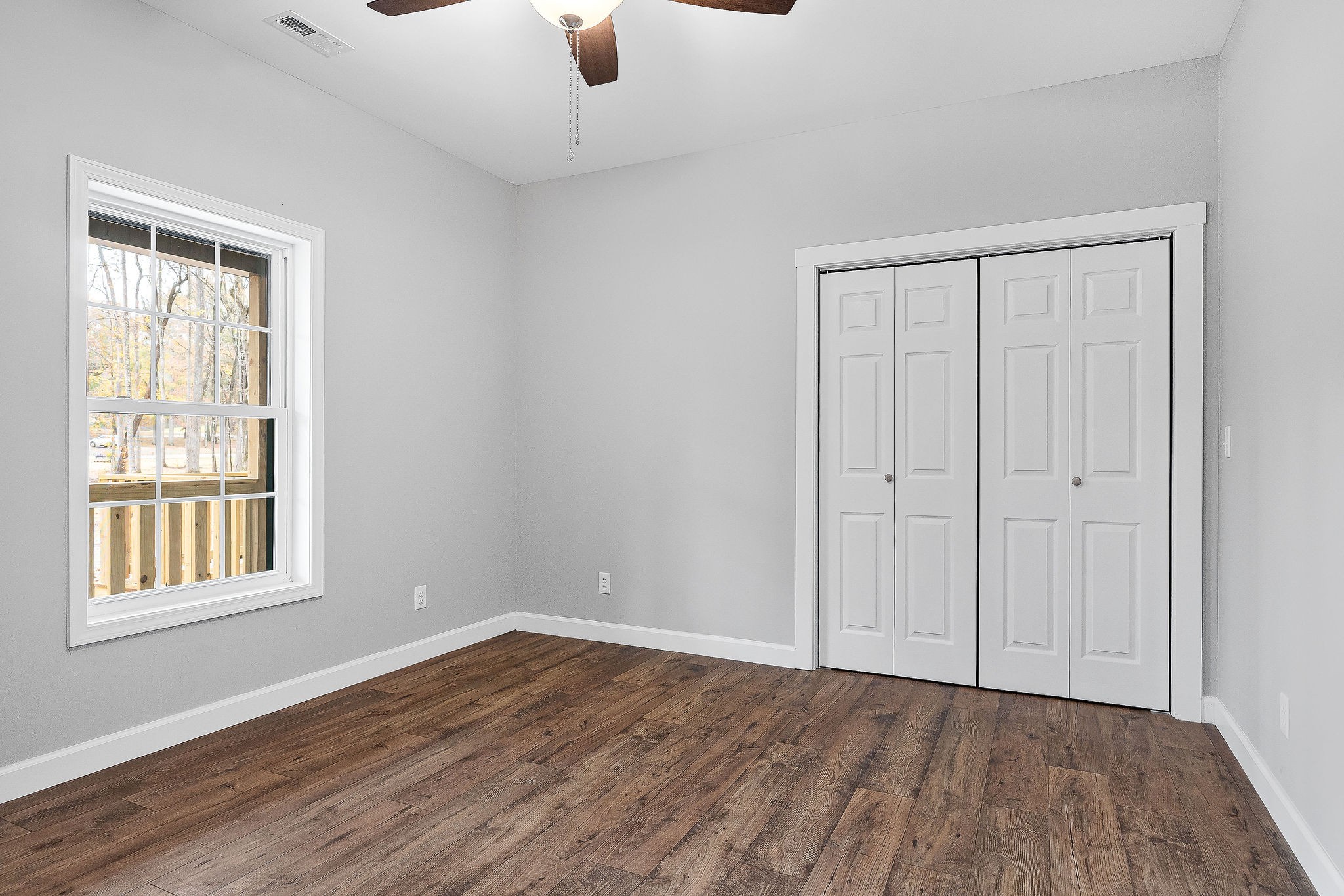 179 Park Road Rickman, TN 38580 - Photo 19 of 29 a view of an empty room with wooden floor and a window