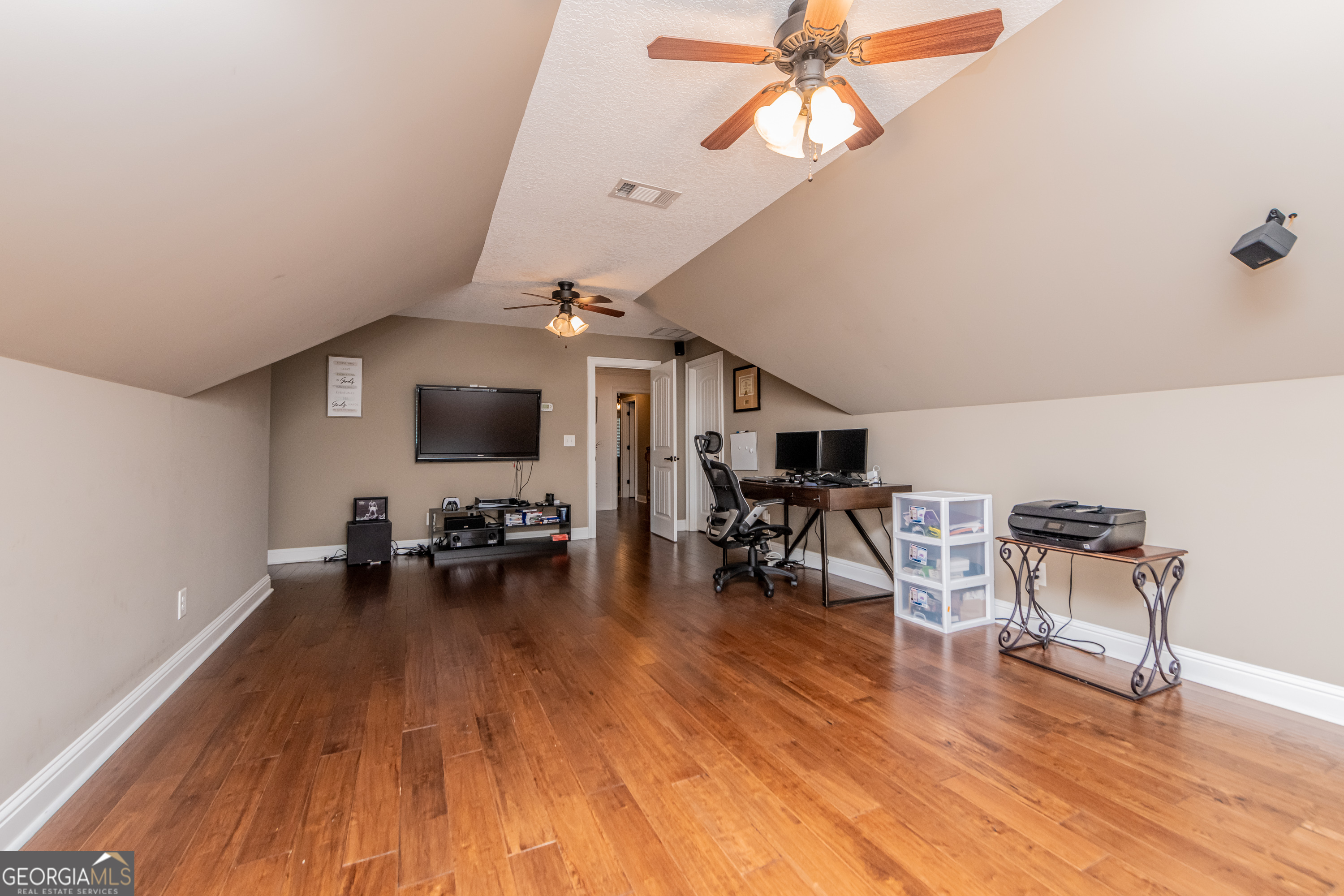 405 Old Bridge Road Warner Robins, GA 31088 - Photo 40 of 55 a living room with furniture and a wooden floor