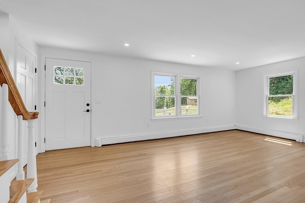 201 Taylor Road Ashby, MA 01431 - Photo 8 of 40 wooden floor in an empty room with a window