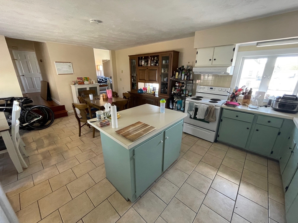 550 Main Street, Unit 2 Woburn, MA 01801 - Photo 6 of 14 a view of kitchen and sink
